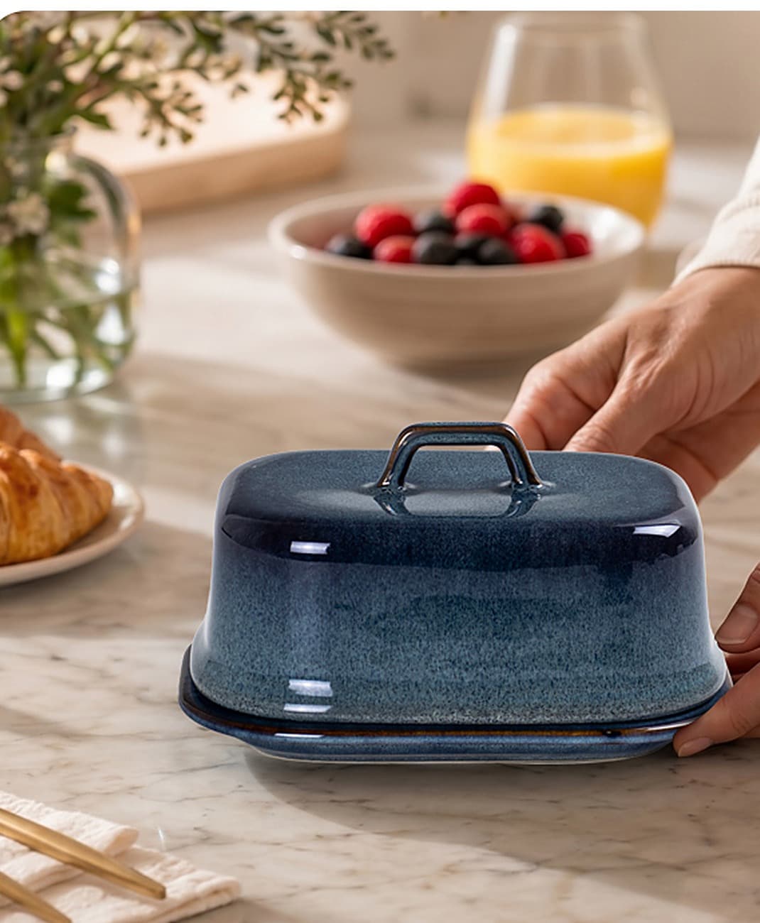 SABN STORE ceramic butter dish on a marble breakfast table